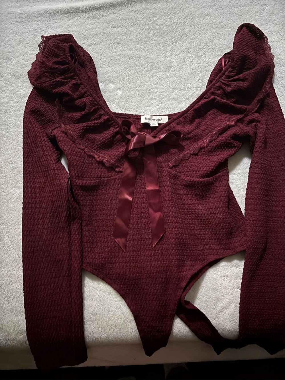 Francesca's Collections Wine Ruffle-Trim Long Sleeve Bodysuit